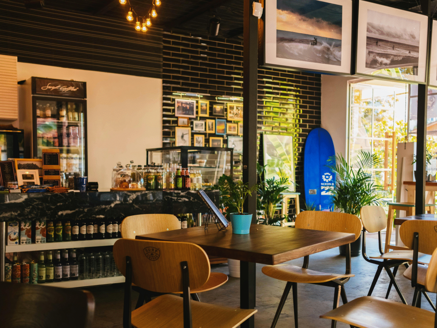 Cafe with seating and background music PA system.